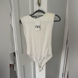 Zara brand new with tags white shoulder padded high neck bodysuit.